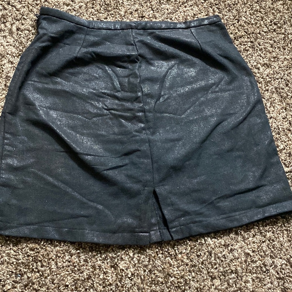Black slightly glittered skirt